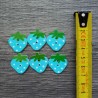 Set of wooden buttons, strawberry, blue