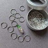 Set of stitch markers (30 silver + 1 main green)