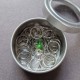Set of stitch markers (30 silver + 1 main green)