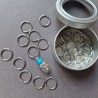 Set of stitch markers (30 silver + 1 main turquoise)