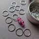 Set of stitch markers (30 silver + 1 main pink)
