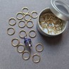 Set of stitch markers (30 gold + 1 main purple)